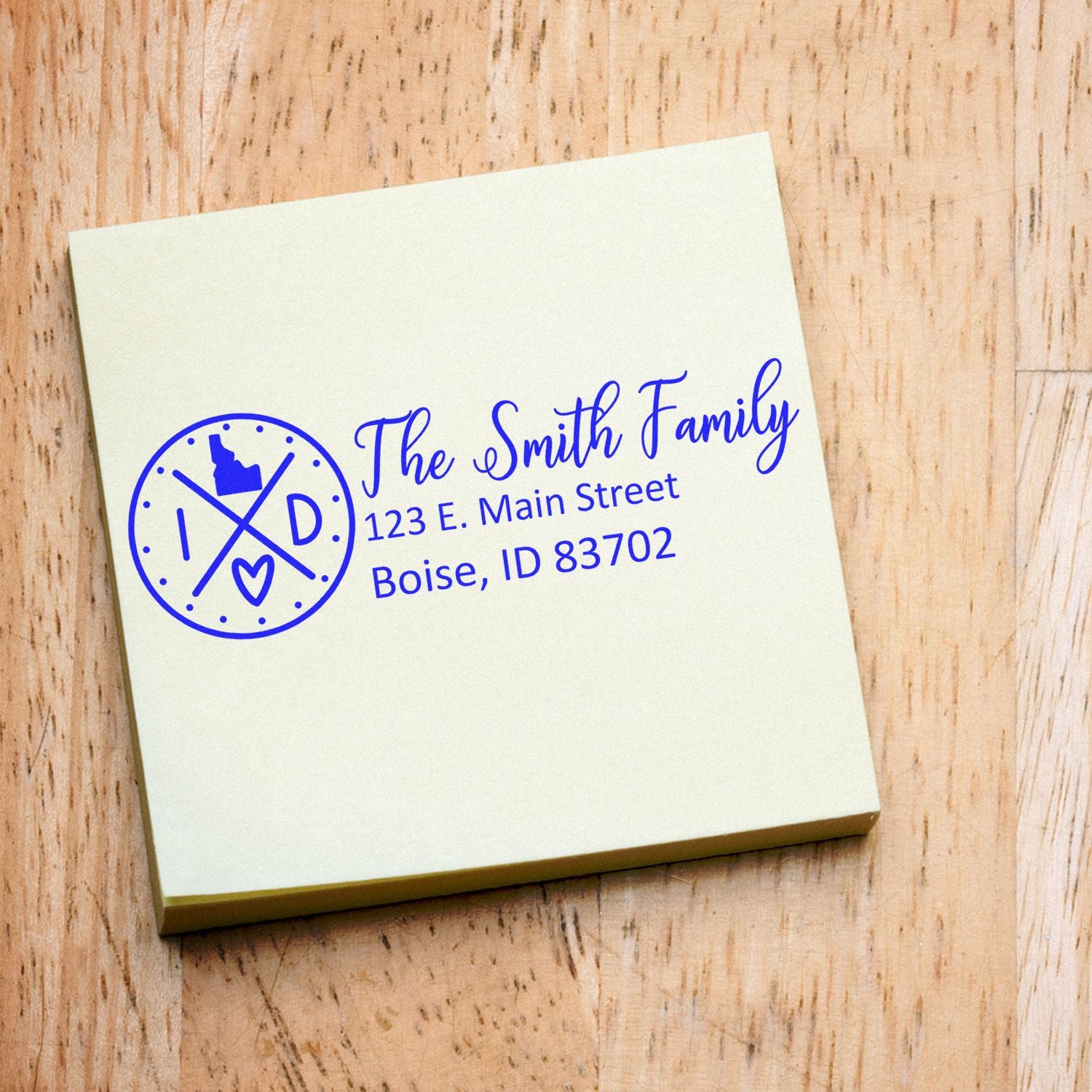 Custom family address rubber stamp with monogram logo and return address for envelopes, cards, and stationery.