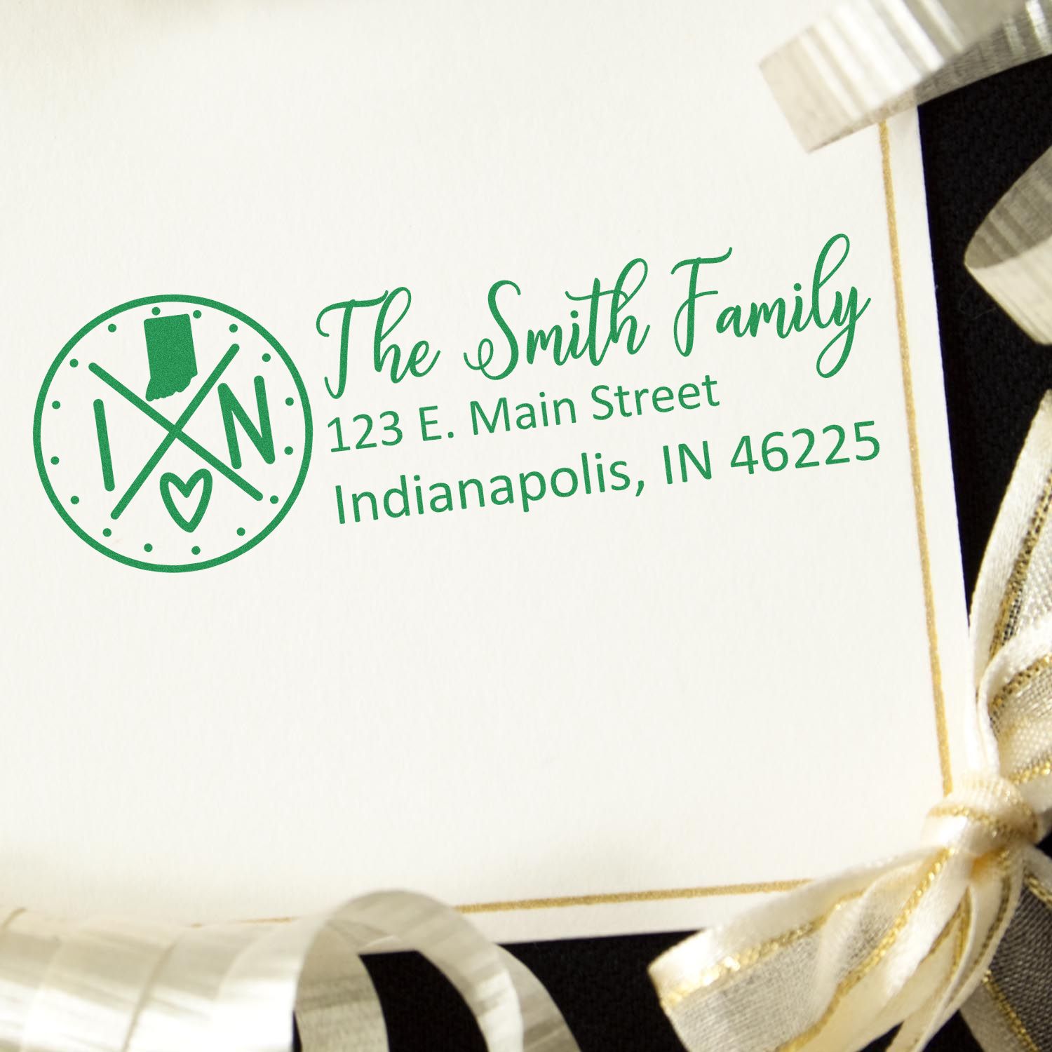 Custom return address rubber stamp for The Smith Family with monogram logo and Indianapolis, IN address for stationery.