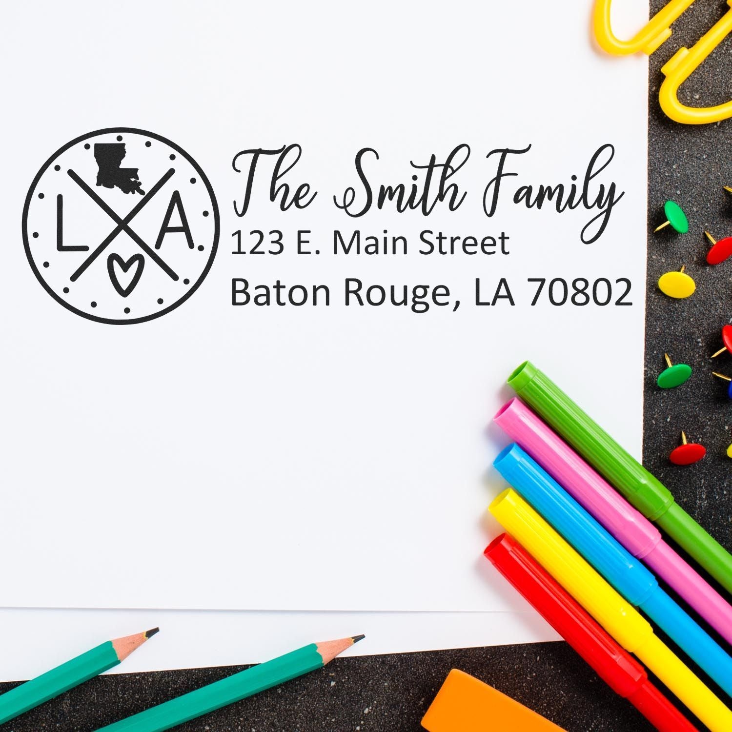 Custom return address rubber stamp for The Smith Family with Louisiana logo and Baton Rouge, LA 70802.