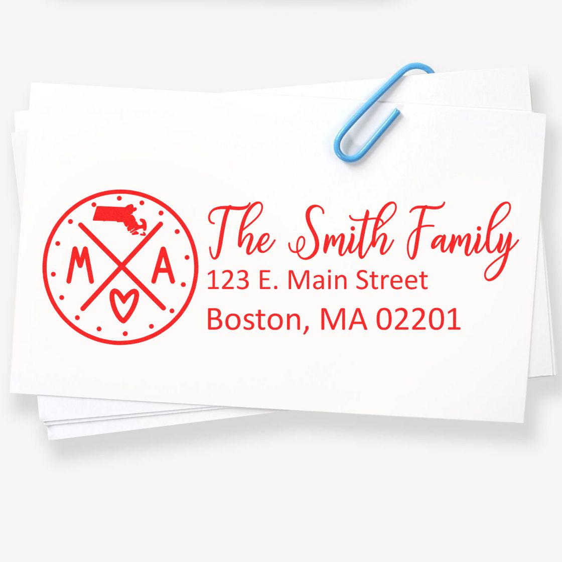 Custom family return address rubber stamp with monogram and Boston, MA address for personalized envelopes.