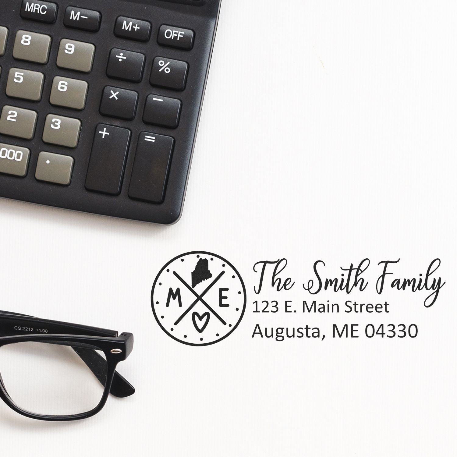 Custom family return address rubber stamp design with Maine monogram and Augusta, ME address.