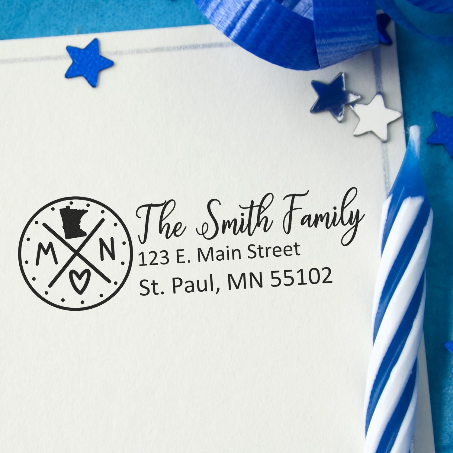 Custom return address rubber stamp for The Smith Family in St. Paul, MN, for personalized envelope addressing.