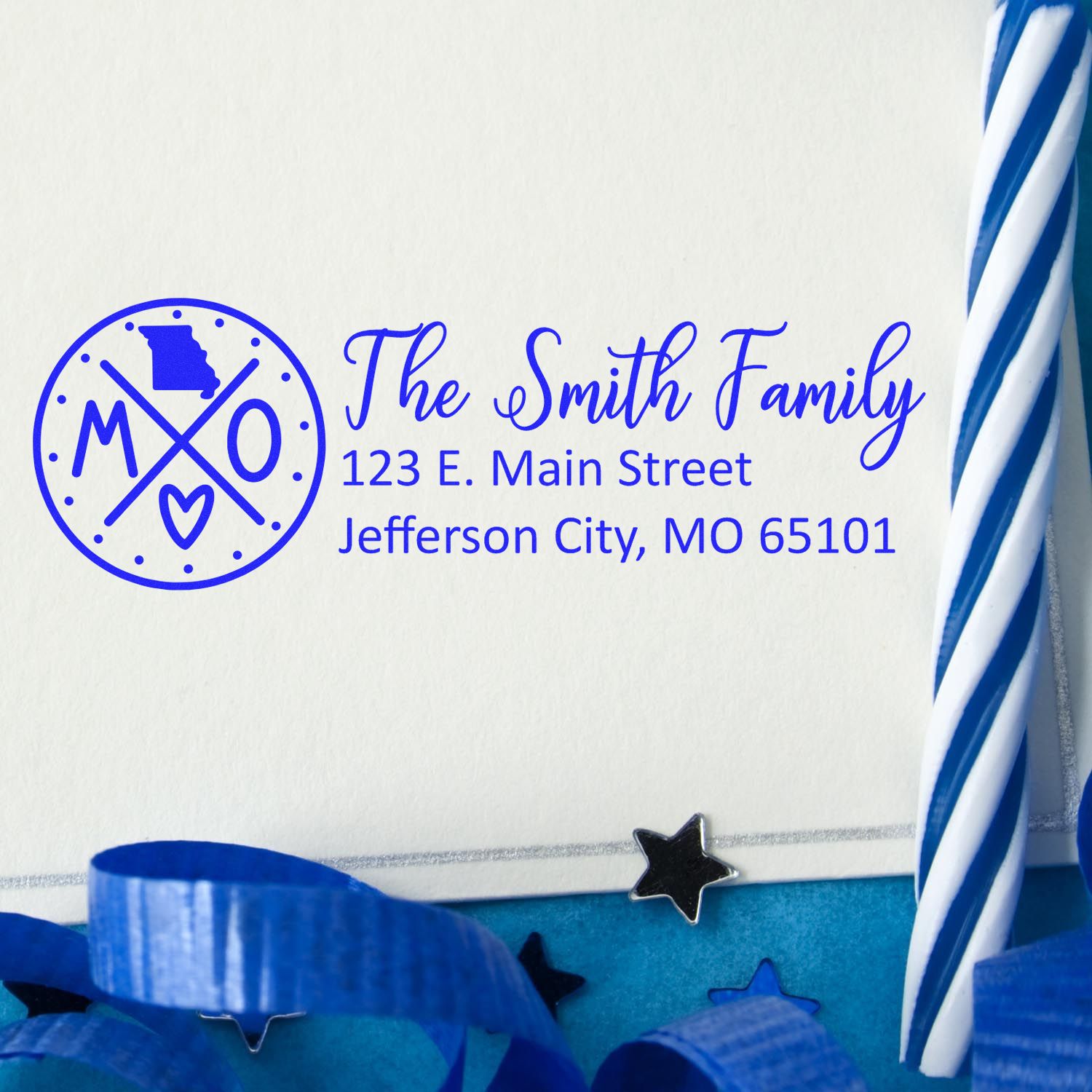 Custom family address rubber stamp with Missouri monogram, personalized name, and return address for envelopes and stationery.