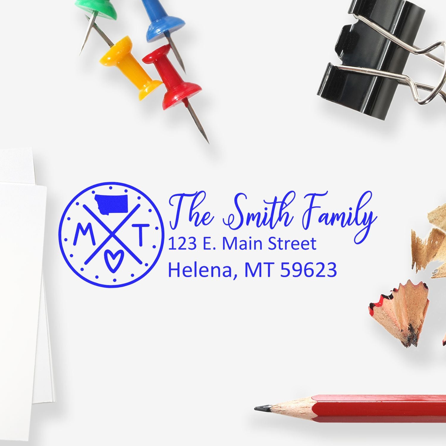 Custom rubber stamp with The Smith Family return address, monogram logo, and Helena, MT address for personalized stationery.