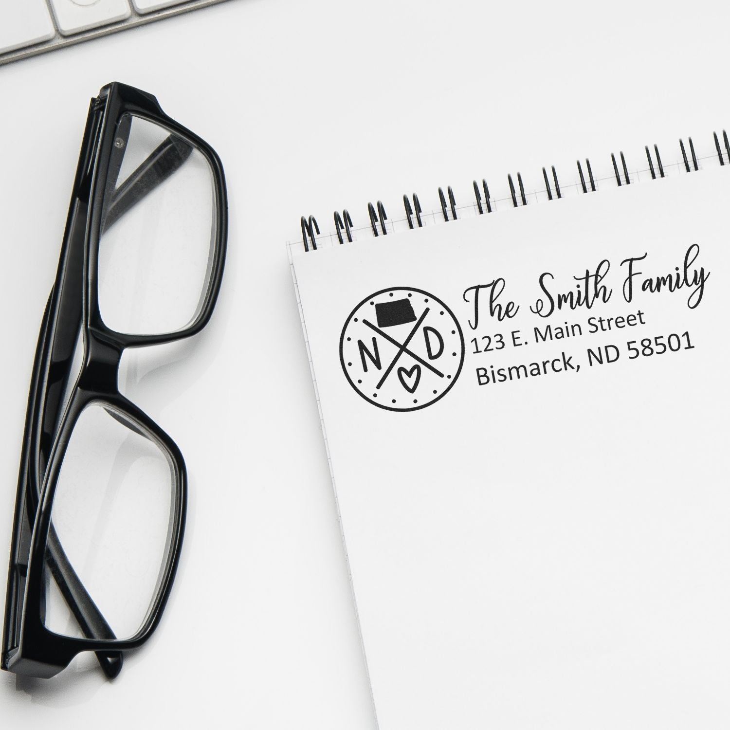 Custom return address rubber stamp for The Smith Family with address logo, ideal for envelopes and stationery.