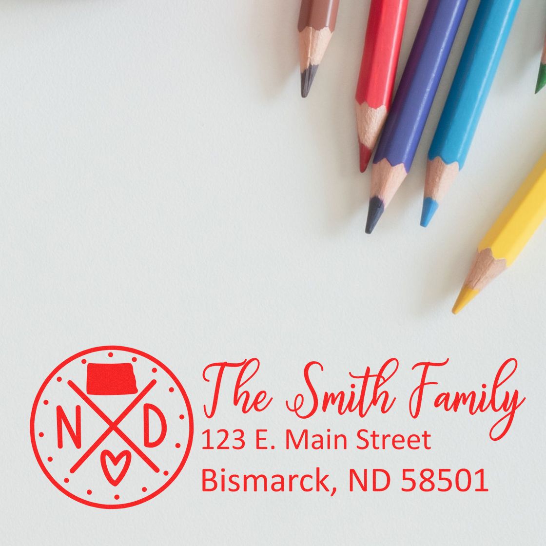 Personalized family return address rubber stamp with monogram and Smith family address in Bismarck, ND.