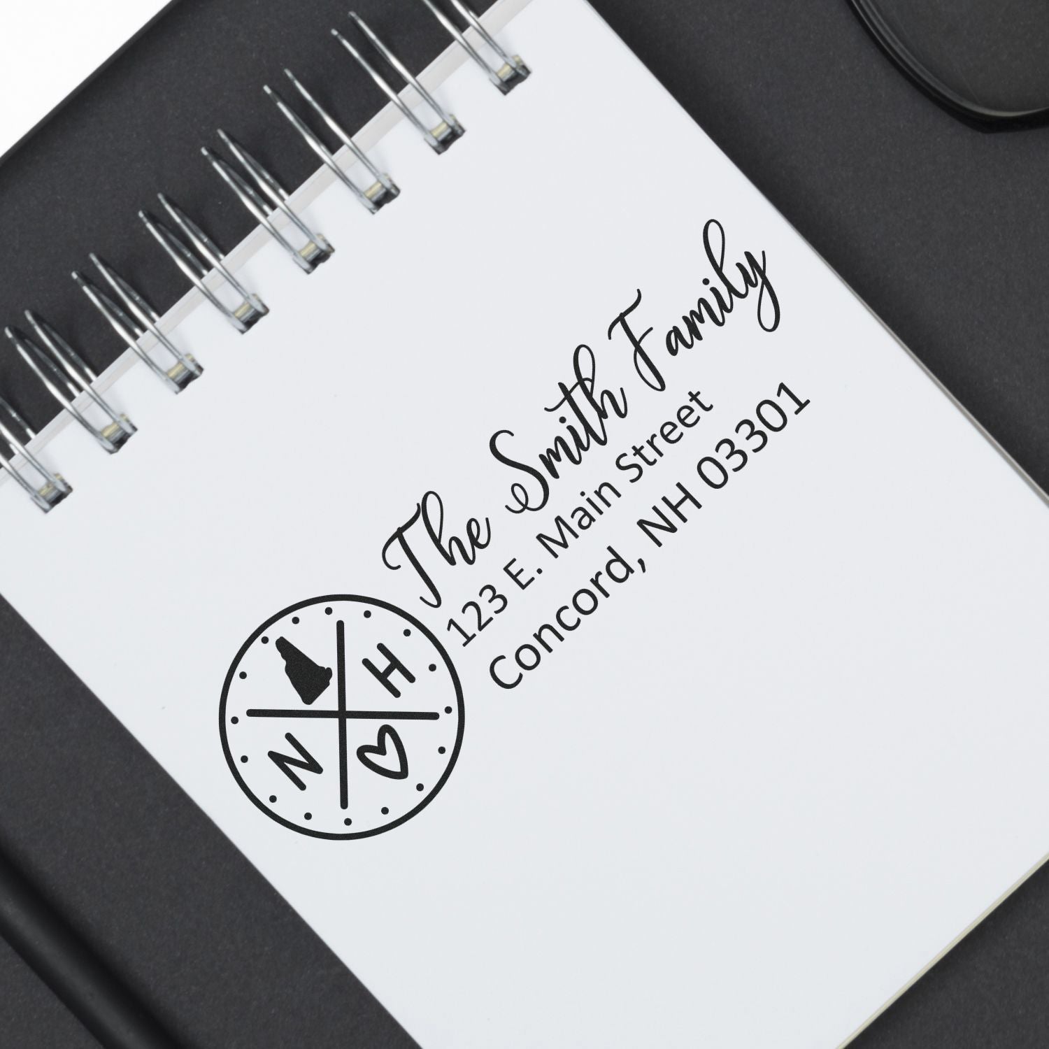 Personalized return address rubber stamp for The Smith Family with monogram and Concord, NH address.