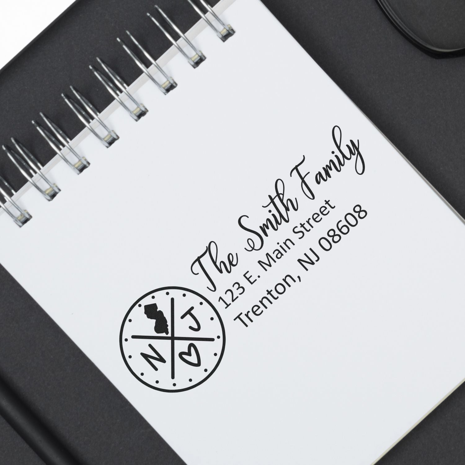 Personalized return address rubber stamp for The Smith Family, Trenton, NJ 08608.