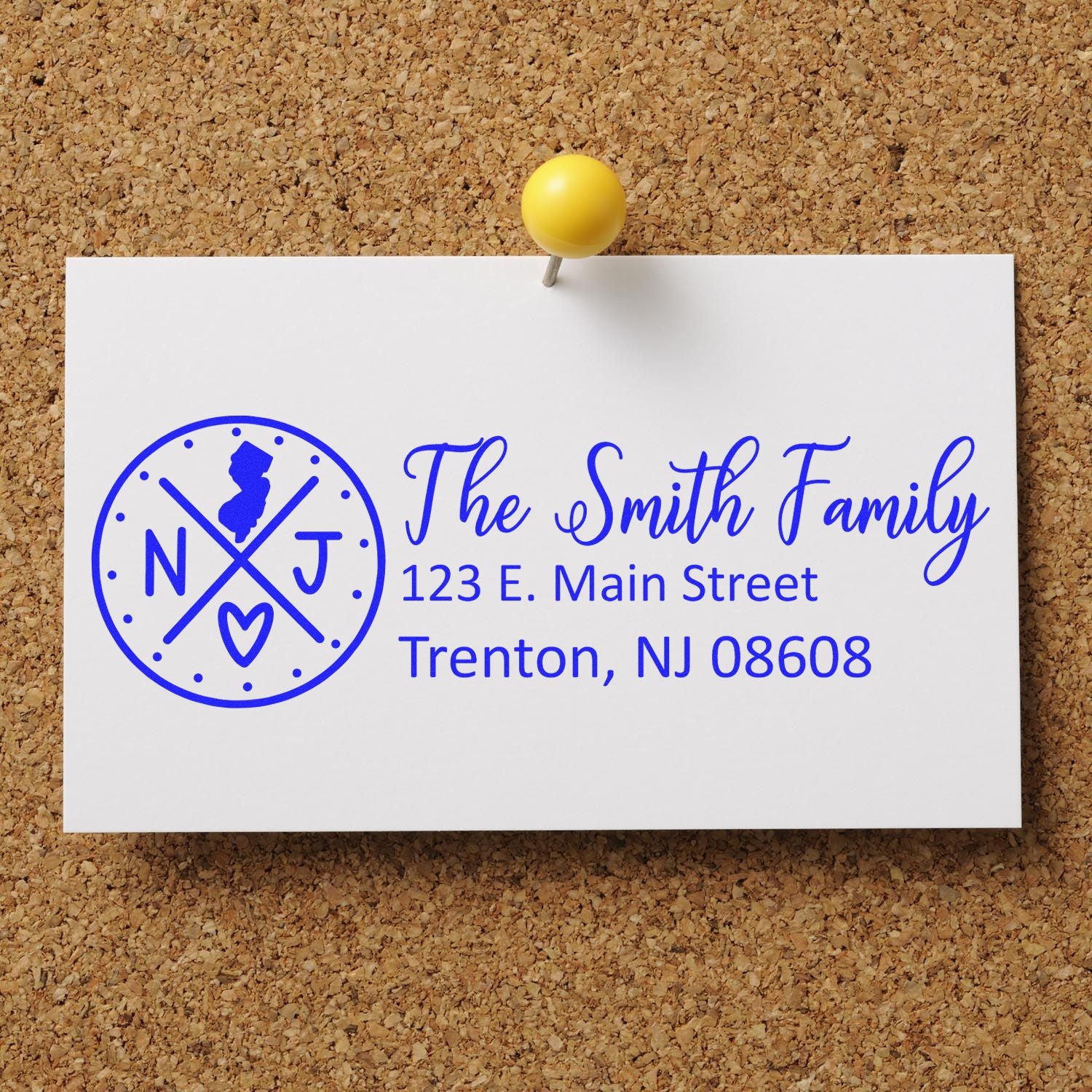 Custom family return address rubber stamp with monogram logo and Smith family address on a pinned proof card.