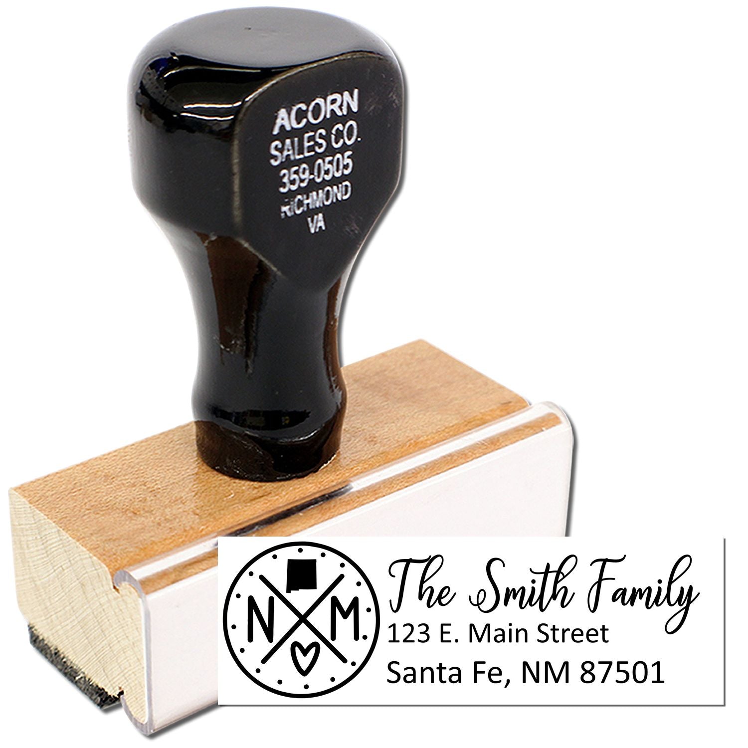 Personalized wooden rubber address stamp with family name and return address for envelopes, wedding invites, and mailings.