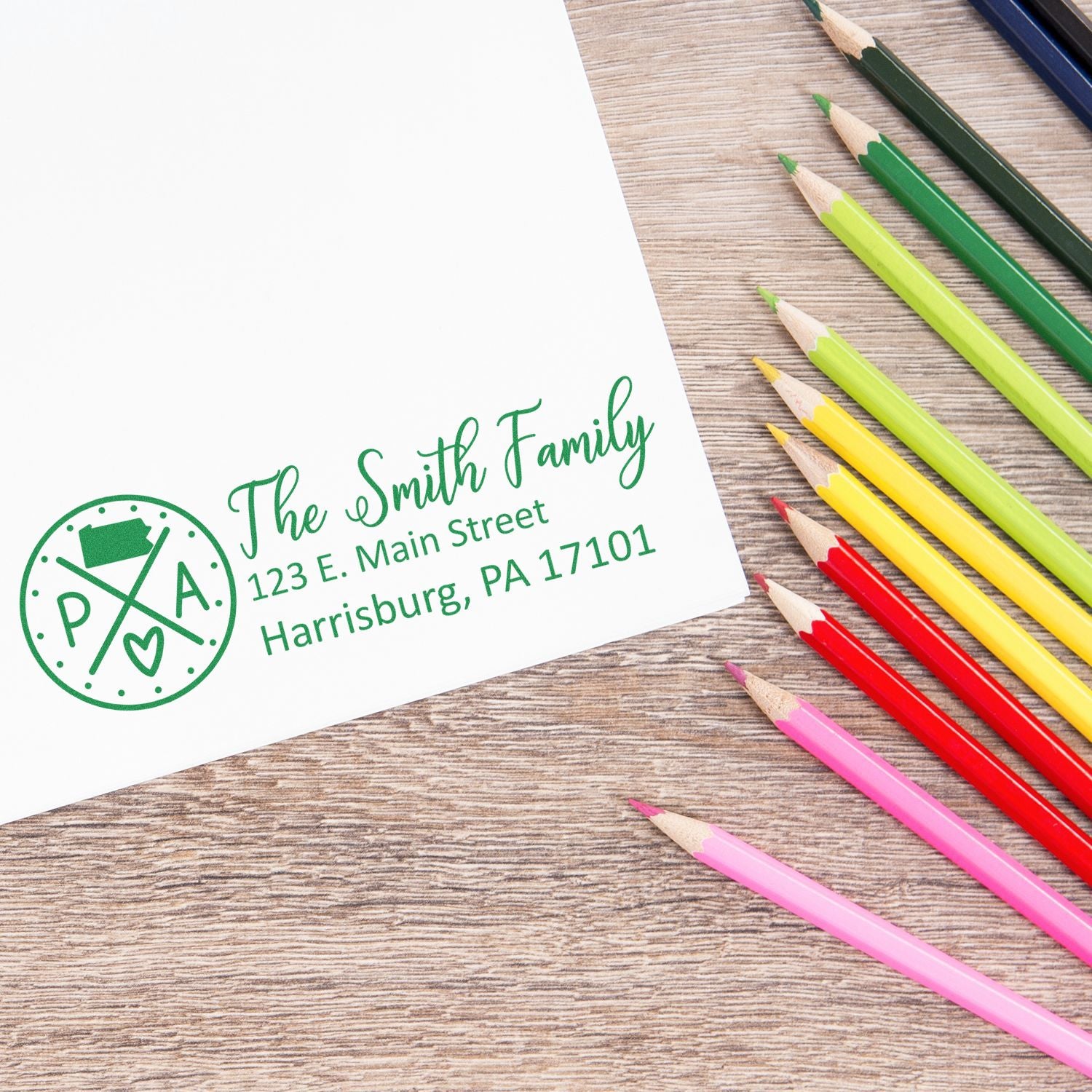 Custom return address rubber stamp with family name, street address and monogram logo for envelopes, cards and stationery.