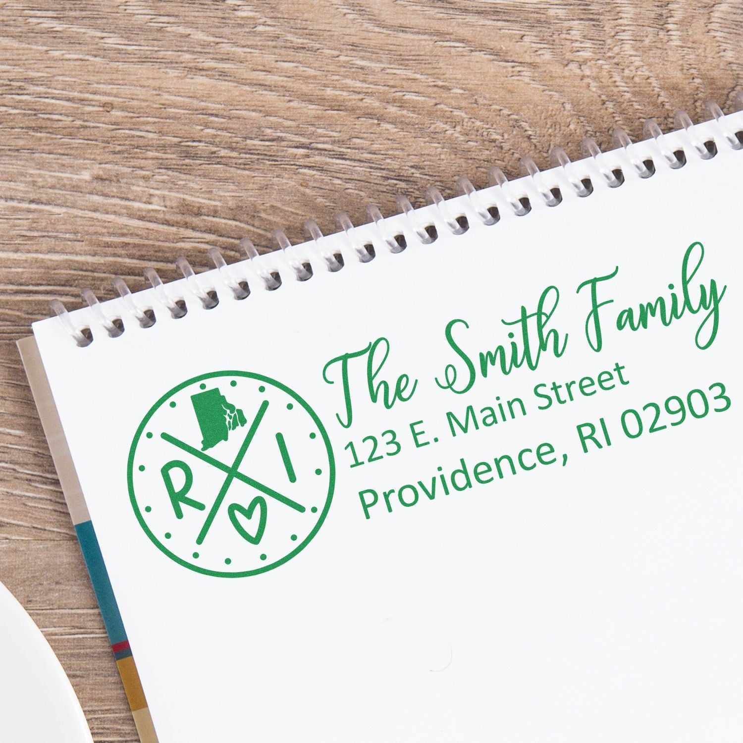 Custom family return address rubber stamp imprint with monogram logo, name, and Providence, RI mailing address.