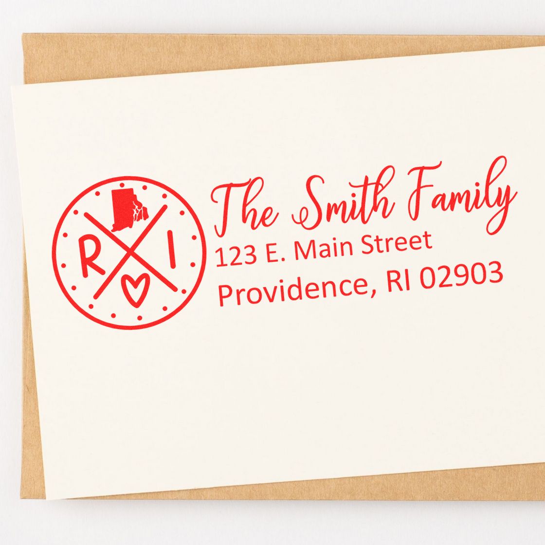 Personalized family return address rubber stamp with red monogram and Smith family Providence, RI address on envelope