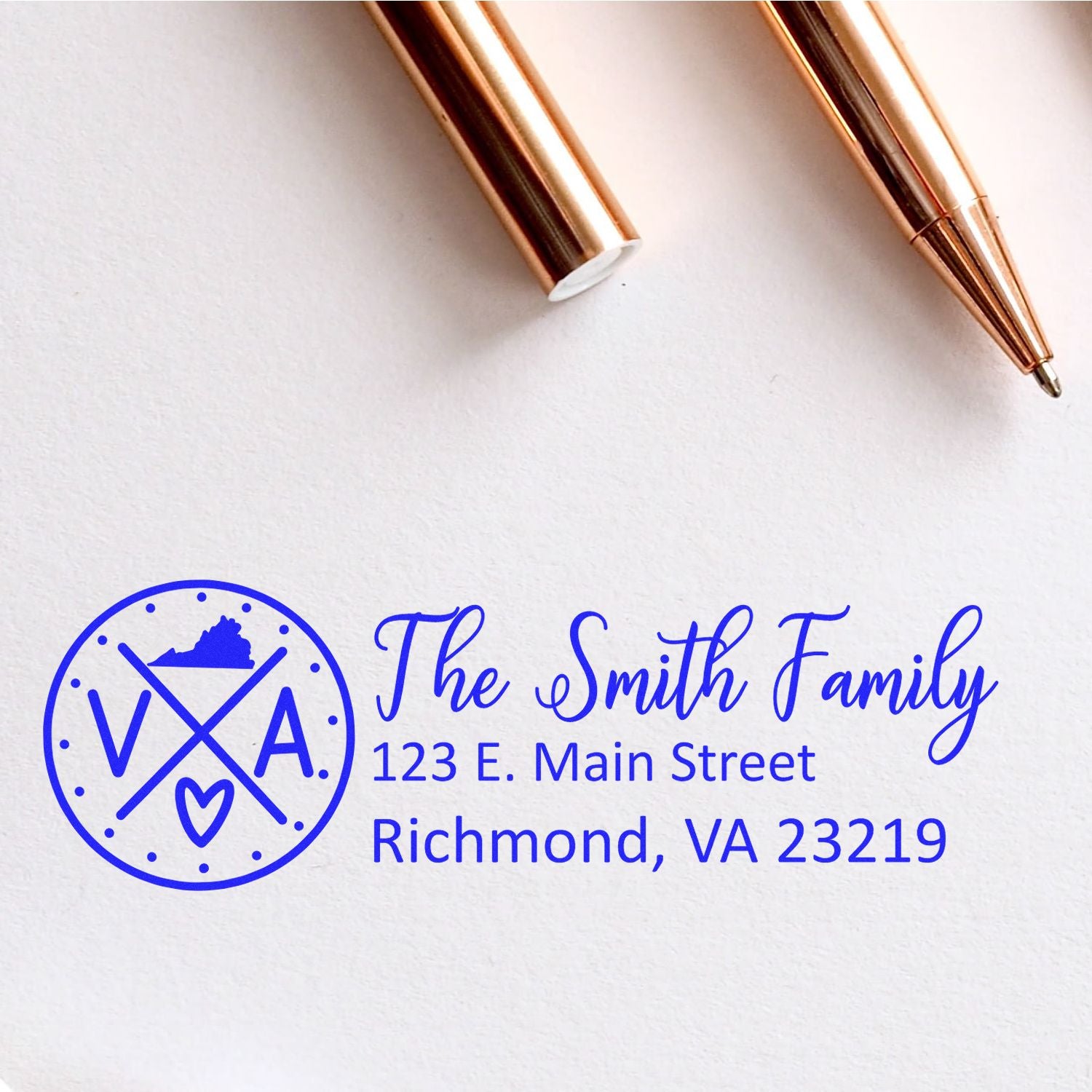 Custom return address rubber stamp for The Smith Family, Richmond, VA, with monogram logo and blue ink.