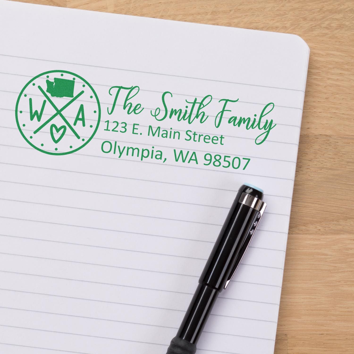 Custom rubber address stamp for The Smith Family, featuring logo and Olympia, WA return address imprint.