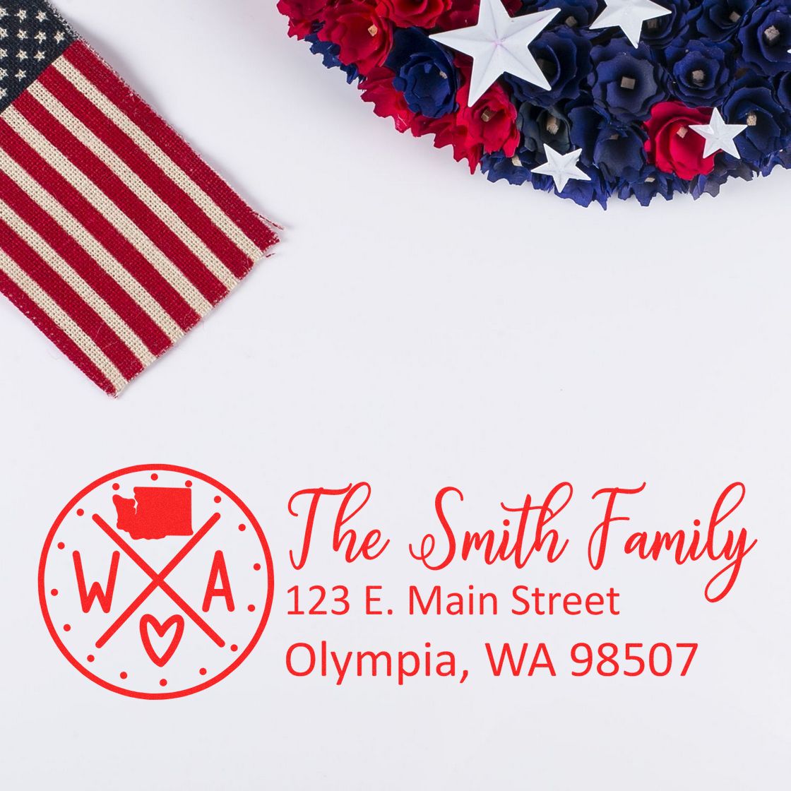 Personalized return address rubber stamp for The Smith Family, Olympia, WA 98507, featuring a monogram logo.