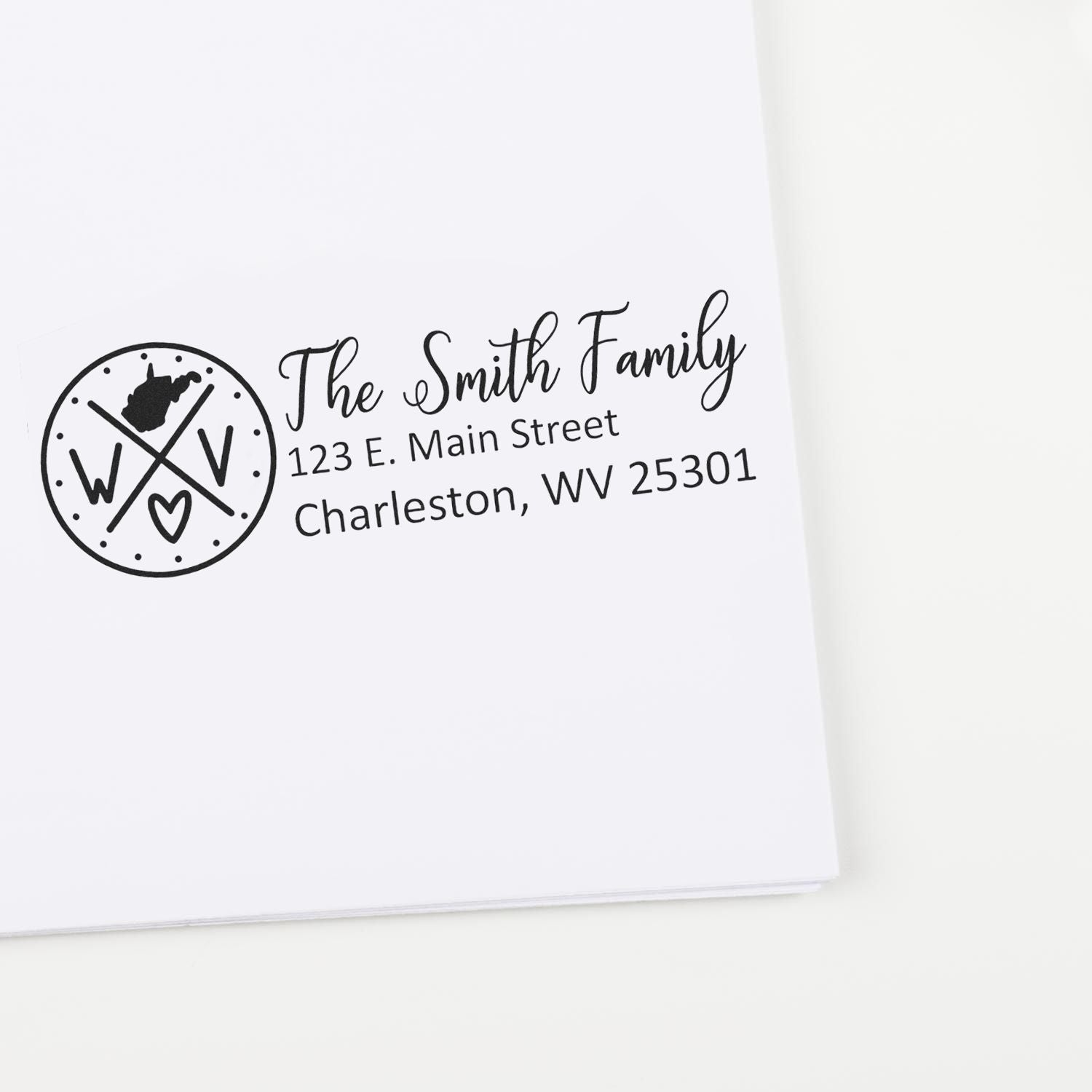 Custom family address rubber stamp with monogram logo, The Smith Family, Charleston, WV return address.