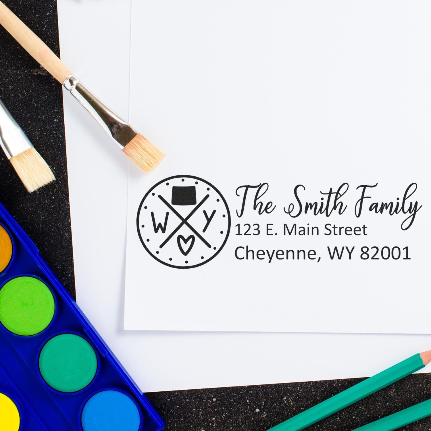 Personalized family address rubber stamp design for stationery, invitations, and branded mailing labels.