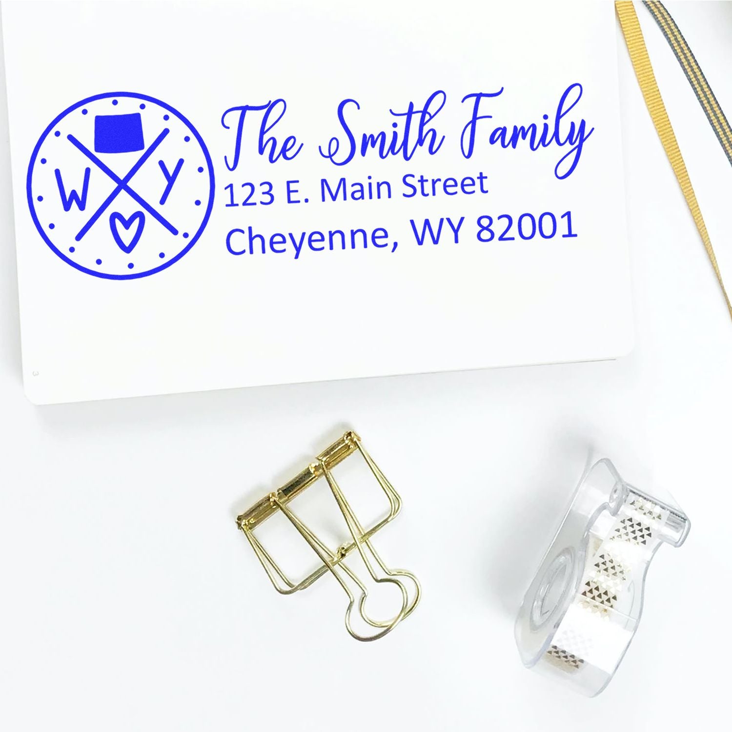 Personalized return address rubber stamp for The Smith Family, with logo and Cheyenne, WY address for envelopes.