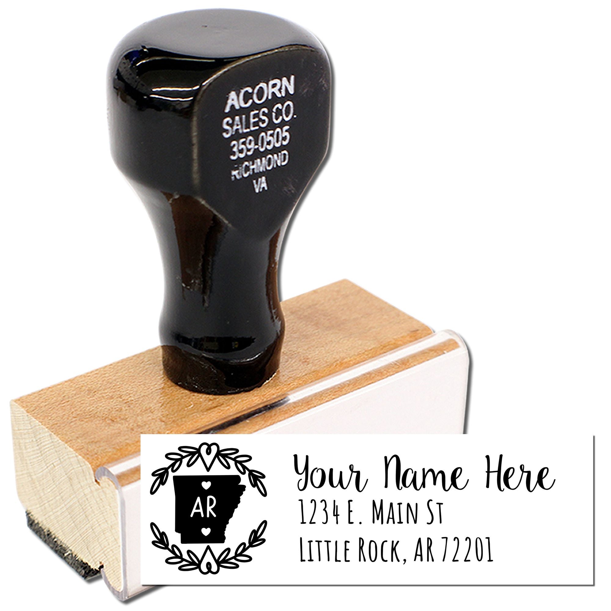 Personalized rubber address stamp with name, street, city, and state for return mailing.