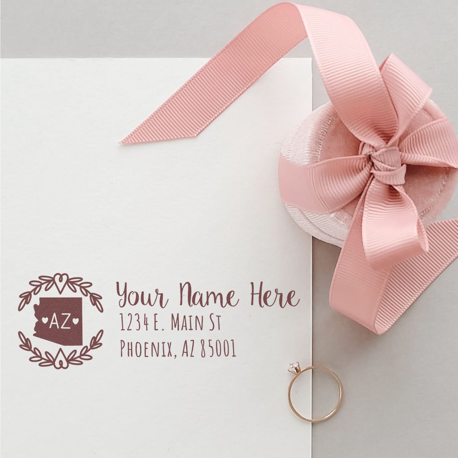 Custom return address rubber stamp for wedding invitations with Arizona monogram, blush ribbon bow, and personalized name and address.