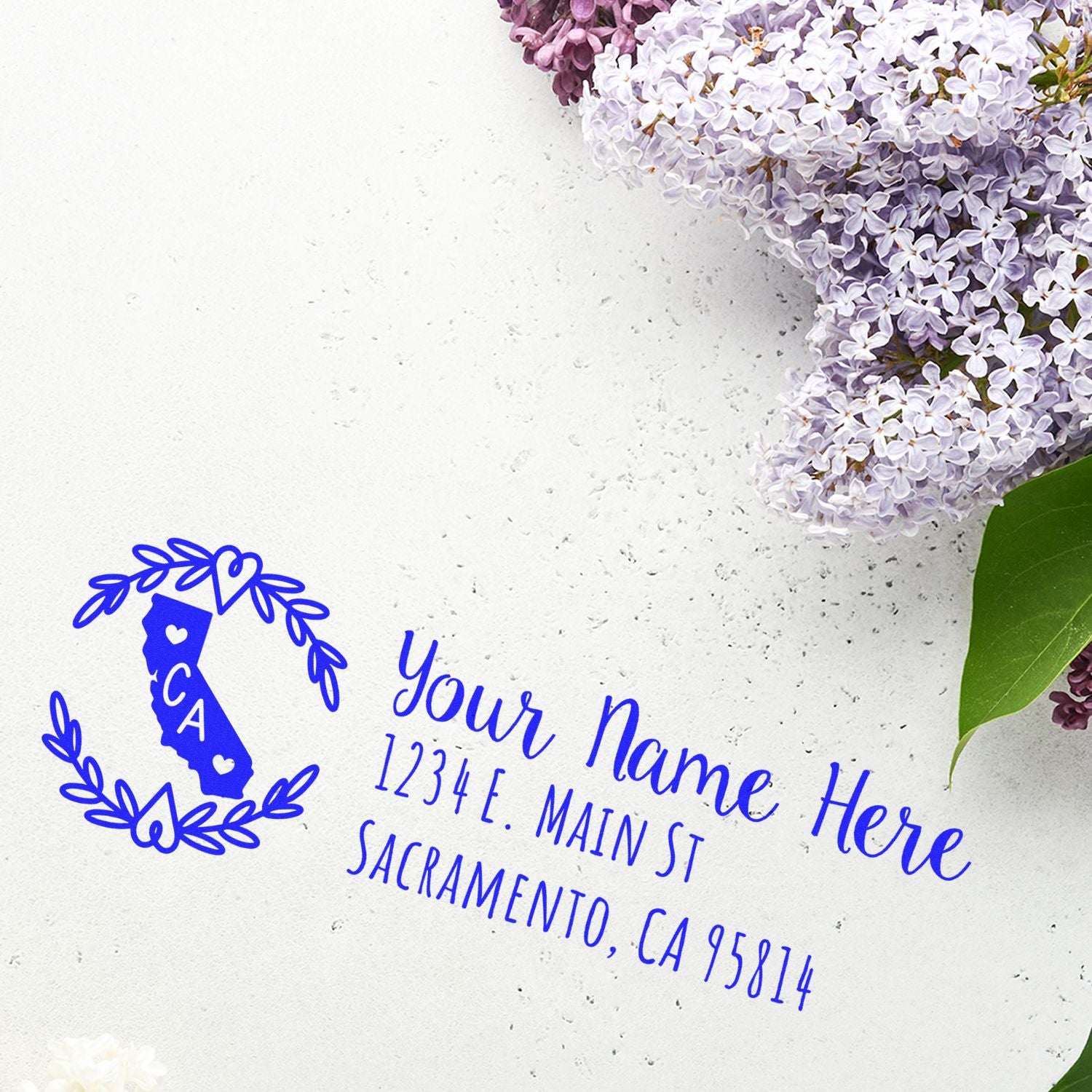 Personalized California return address rubber stamp with floral wreath design for wedding invitations and stationery.