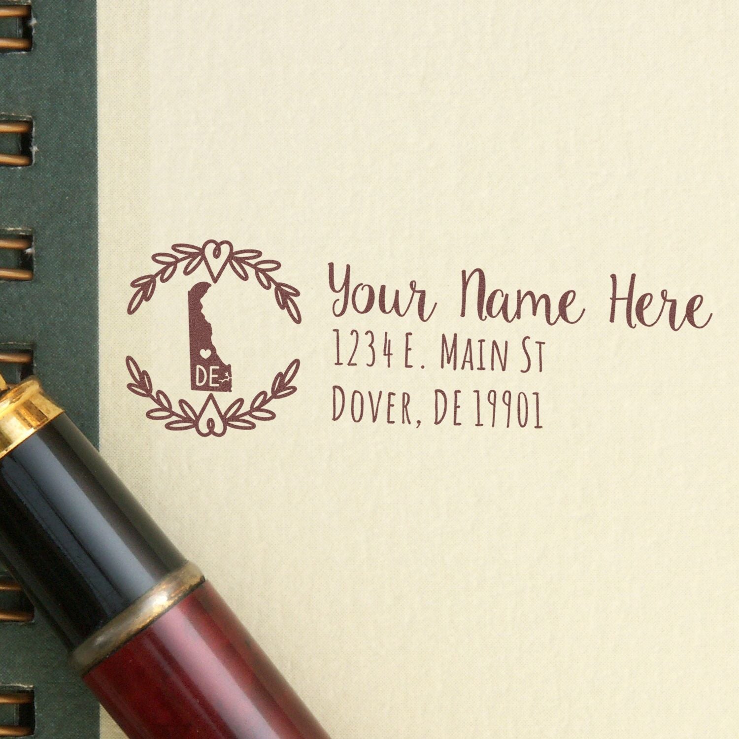 Custom return address rubber stamp with Delaware state design, name, and address for wedding, business, or mailing use.