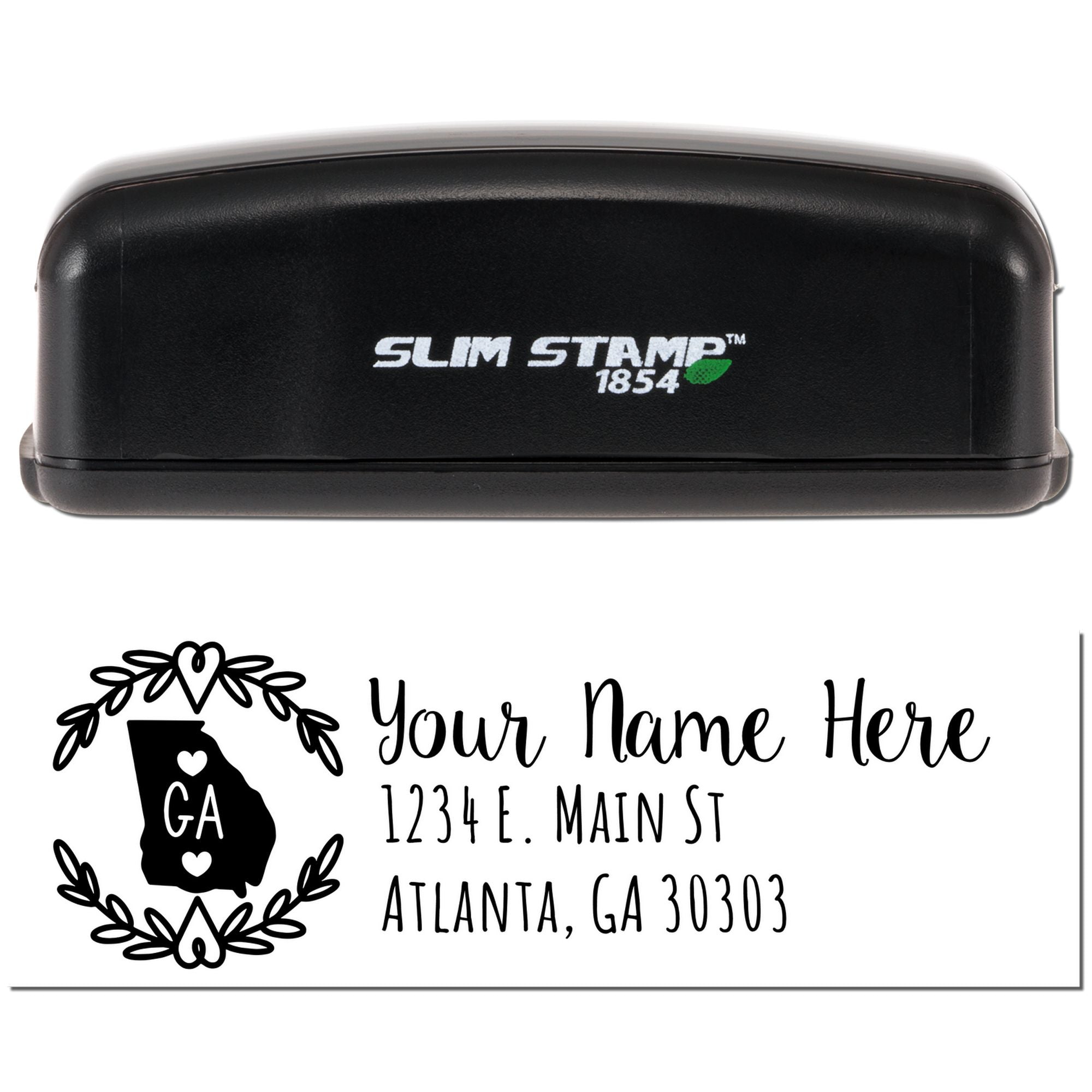 Custom self-inking rubber address stamp with Georgia silhouette, name, and Atlanta return address design.