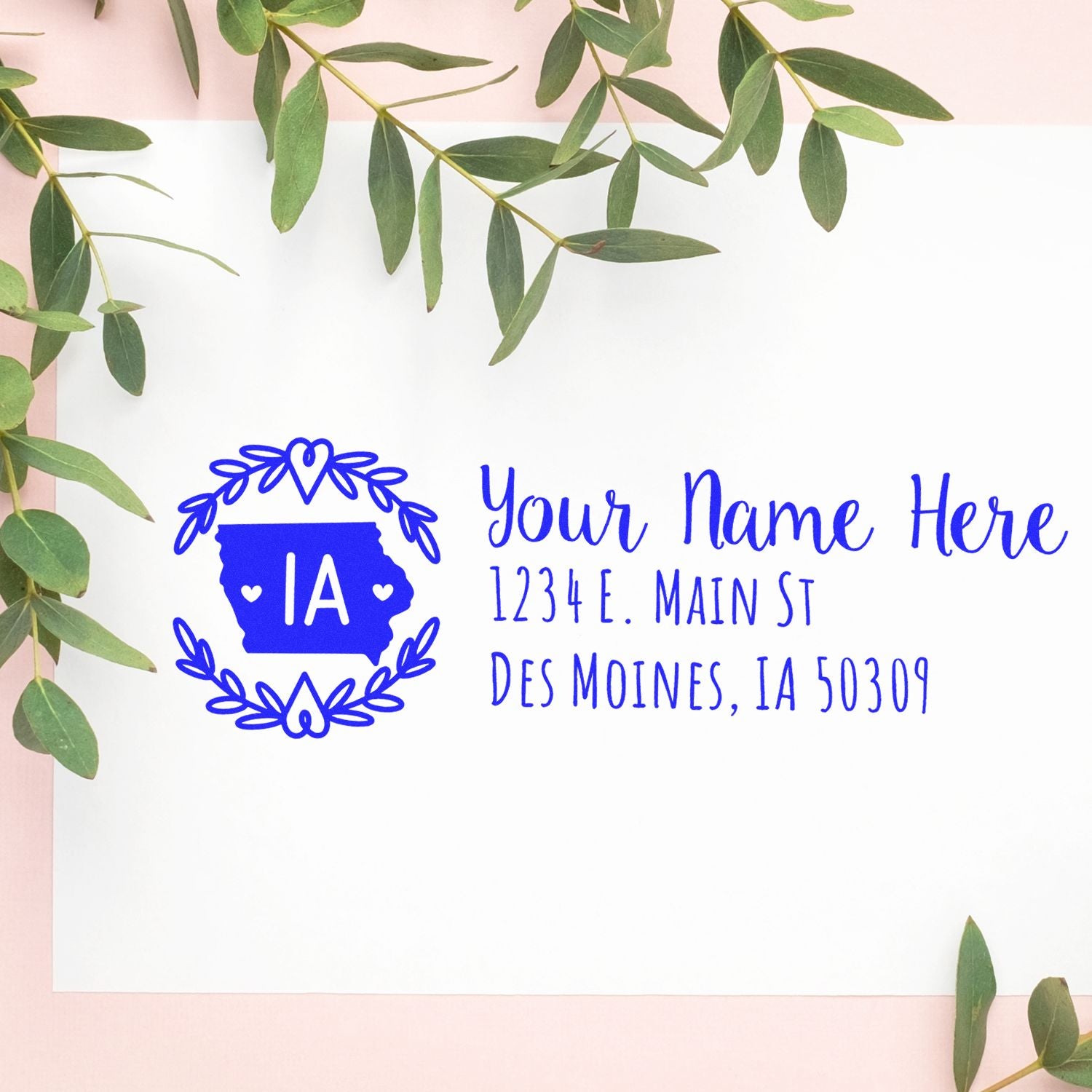 Personalized Iowa return address rubber stamp with custom name, street address, and Des Moines, IA ZIP code.