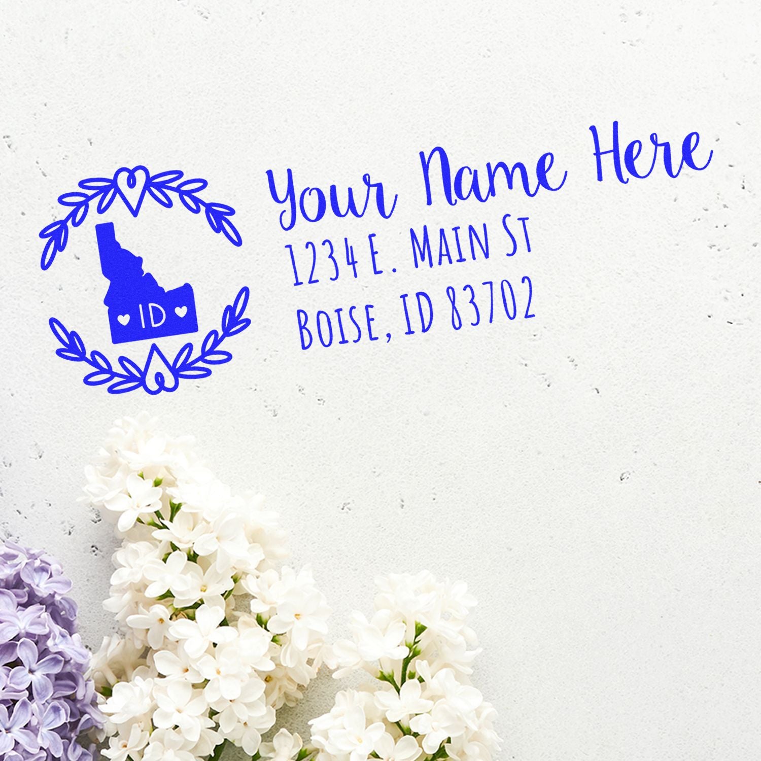 Custom Idaho return address rubber stamp with name, street address, and ZIP code for personalized mailing and stationery.