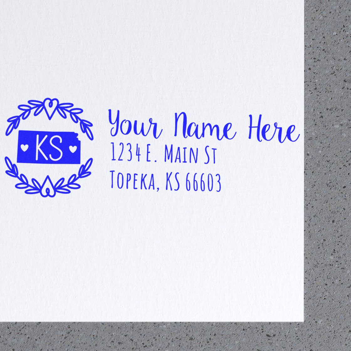 Custom return address rubber stamp with monogram KS wreath, personalized name, street address, and Topeka, KS ZIP code.