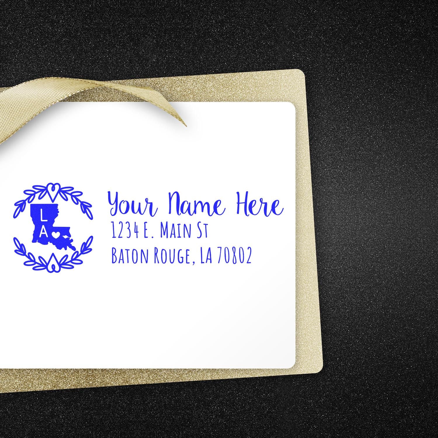 Custom Louisiana return address rubber stamp with floral wreath, blue ink, and personalized name and address.