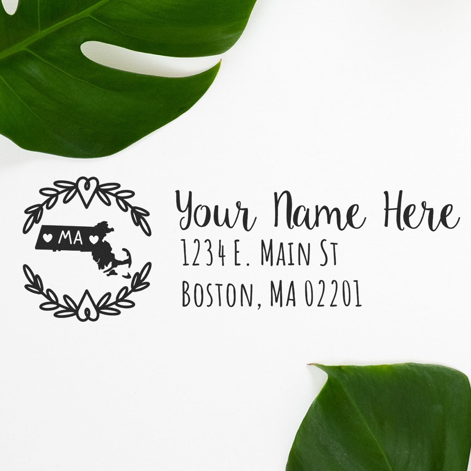 Custom address rubber stamp with Massachusetts state design, floral wreath, and personalized Boston return address.