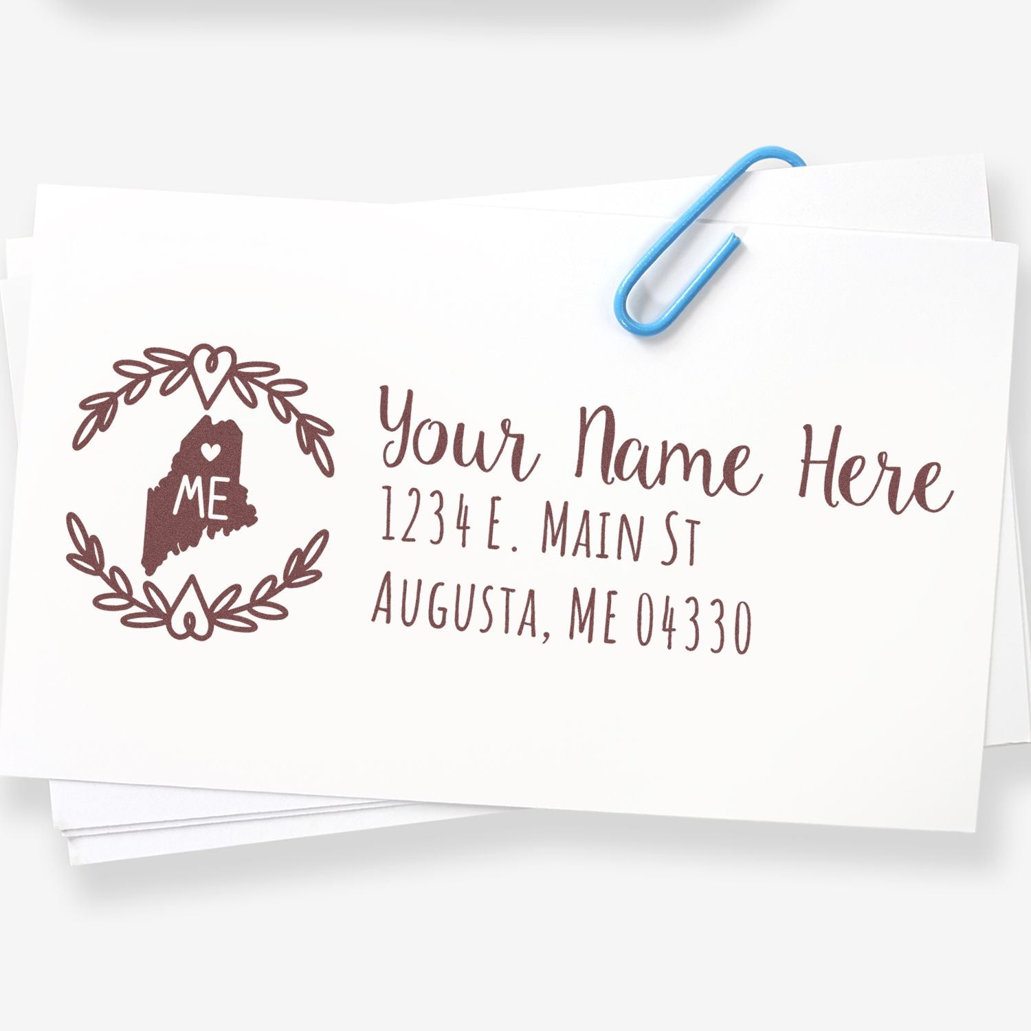 Custom Maine return address rubber stamp for envelopes with floral wreath, name, street address, city and ZIP code.