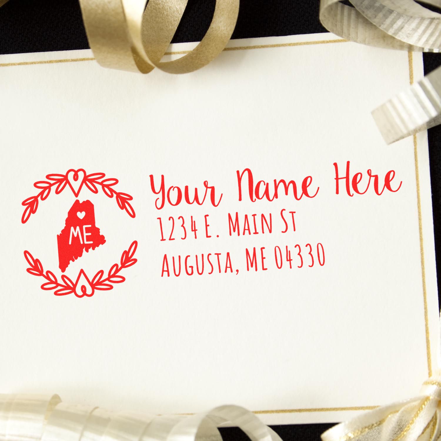 Custom return address rubber stamp with Maine design, floral wreath, and personalized name for envelopes and invitations.