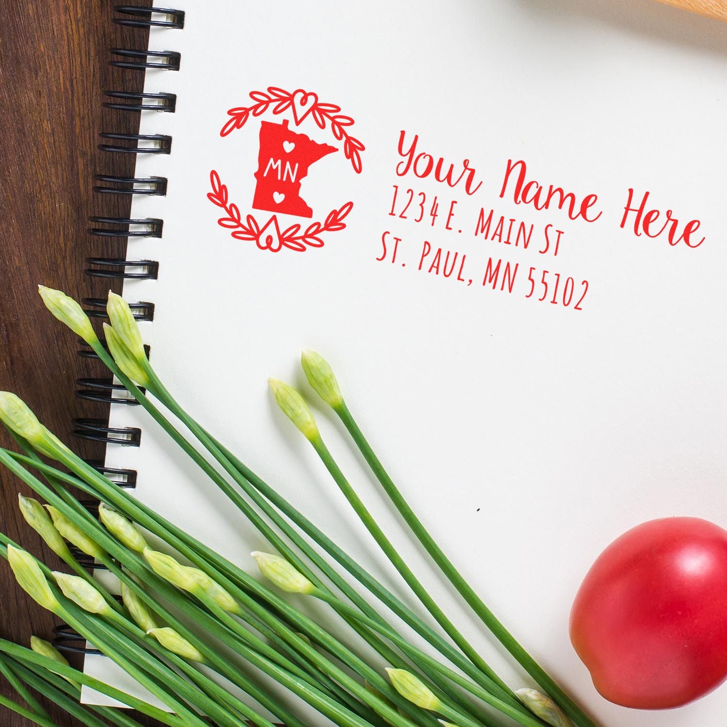 Personalized Minnesota return address rubber stamp with custom name and mailing address in red ink.