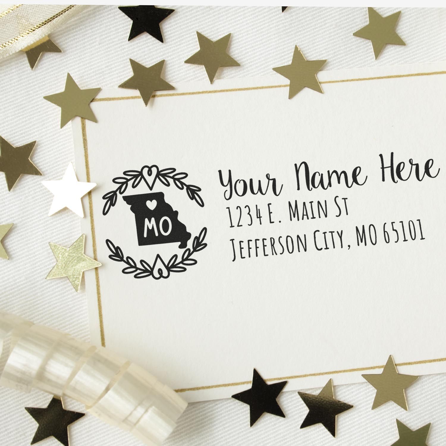 Custom Missouri return address rubber stamp with personalized name, street address, and decorative star envelope design.