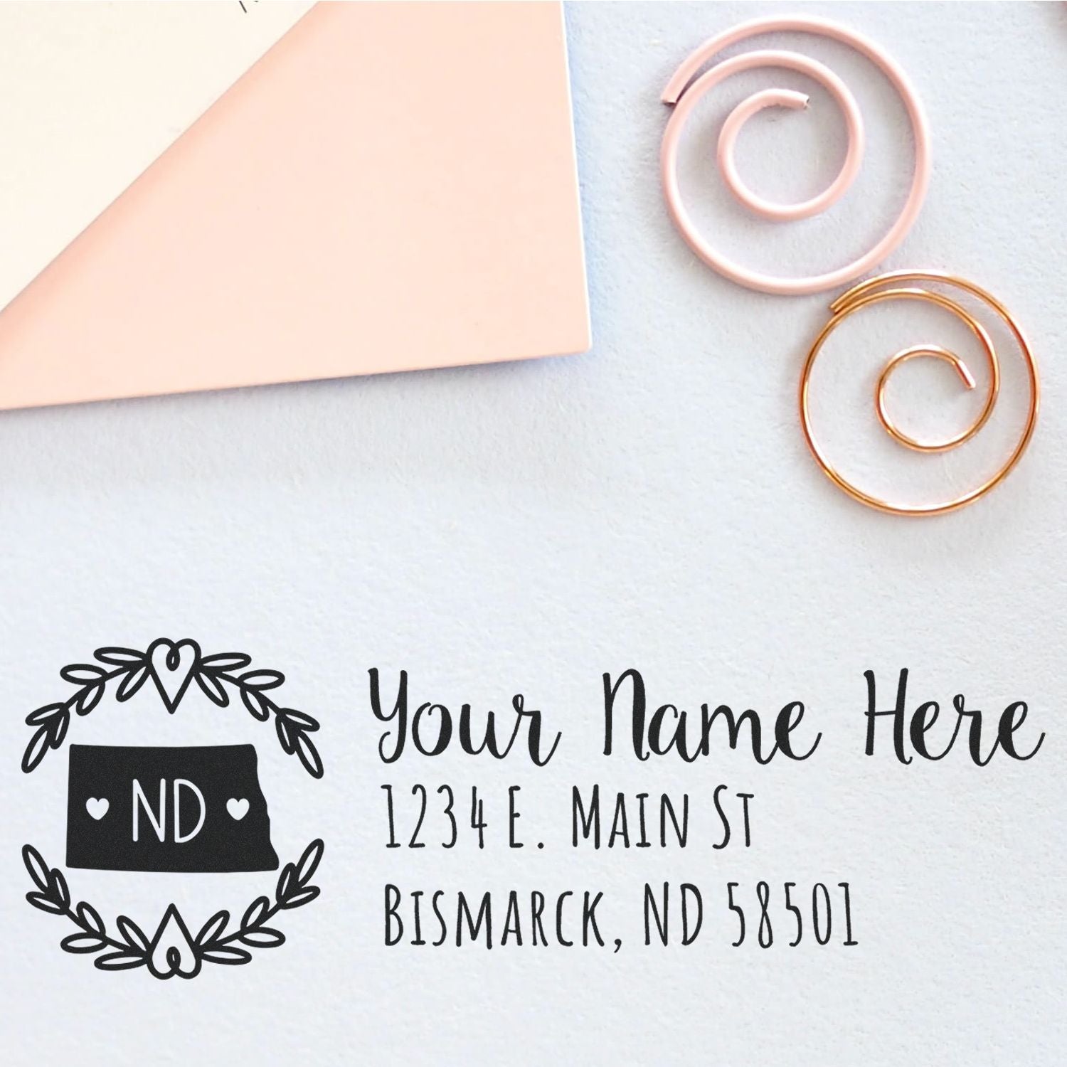Custom North Dakota return address rubber stamp with personalized name, Bismarck address, and floral state design