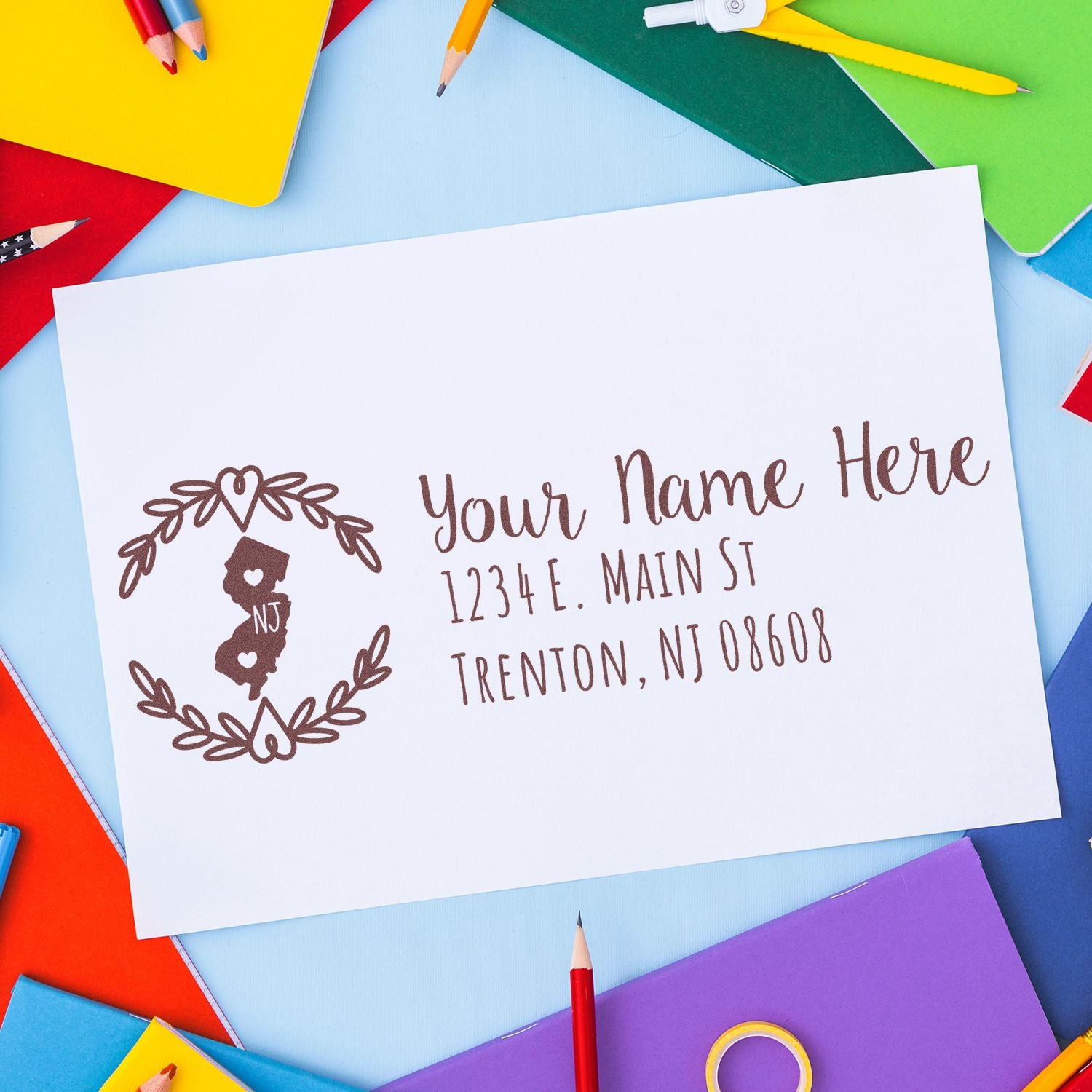 Custom return address rubber stamp with name and NJ address, ideal for wedding invitations, stationery, and envelopes.