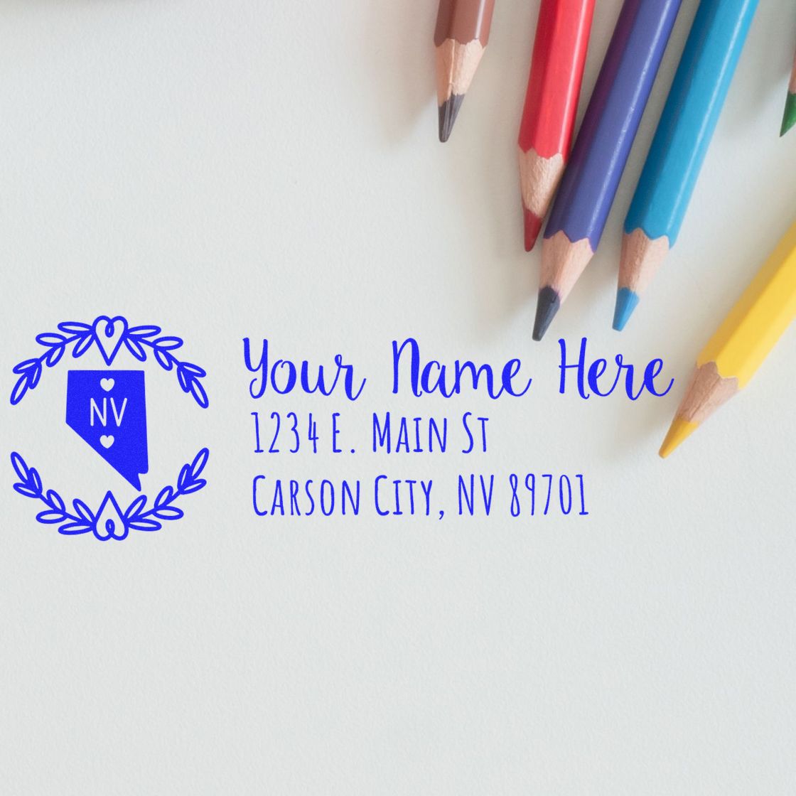 Custom rubber stamp with Nevada wreath return address design and personalized name, street address, and Carson City, NV.