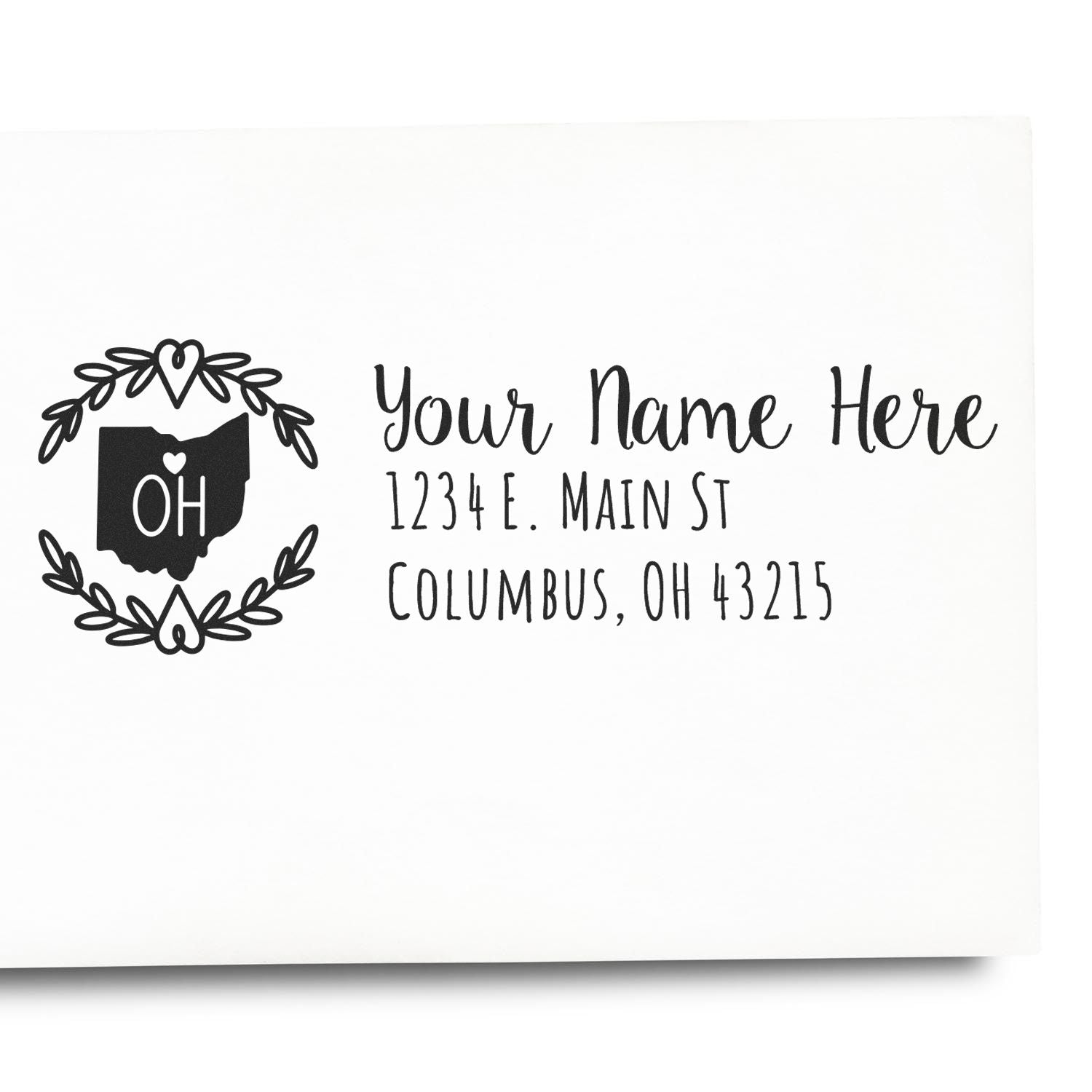 Custom Ohio return address rubber stamp with personalized name and Columbus, OH address, floral wreath design.