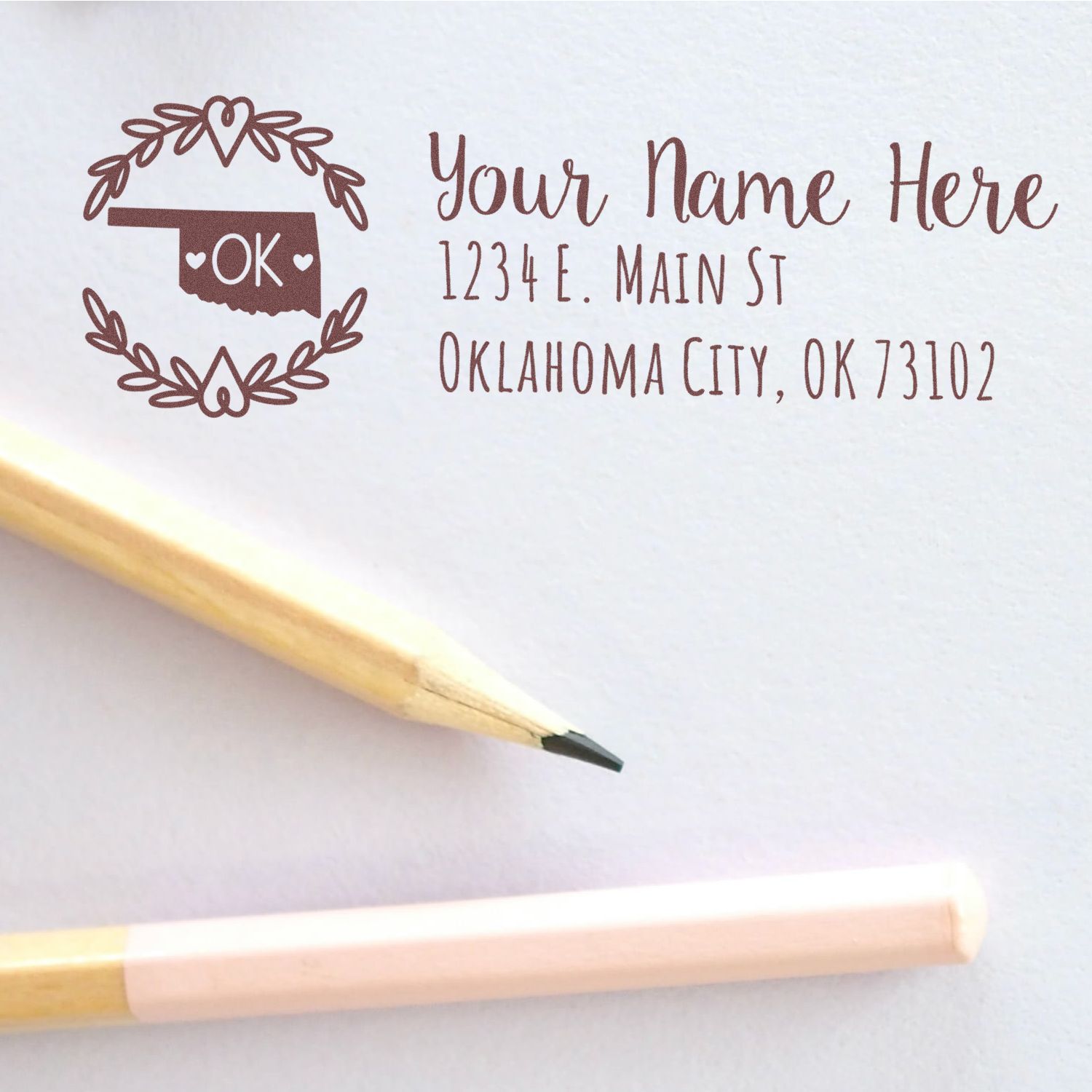 Custom return address rubber stamp with Oklahoma motif, personalized name and Oklahoma City, OK address for envelopes.