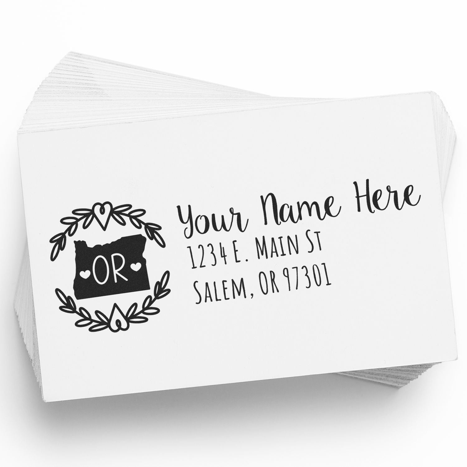 Custom Oregon return address rubber stamp with floral wreath, heart design, and personalized name and mailing address.