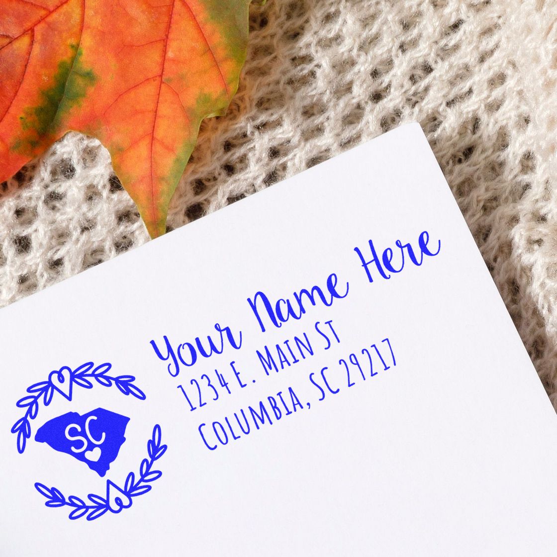 Personalized South Carolina return address rubber stamp with wreath design, ideal for custom envelopes and stationery.