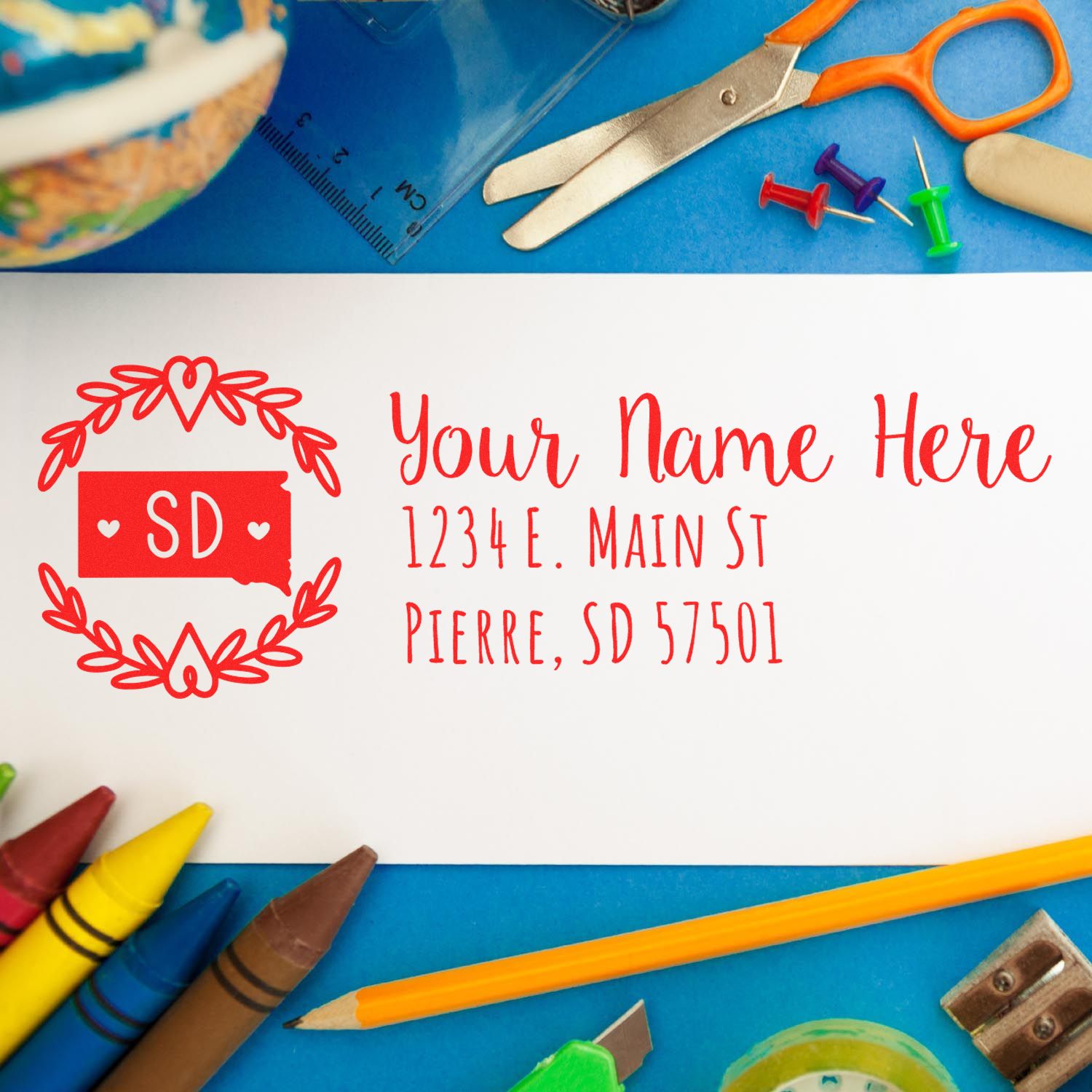 Custom rubber address stamp with South Dakota return address, personalized name, and street address design.