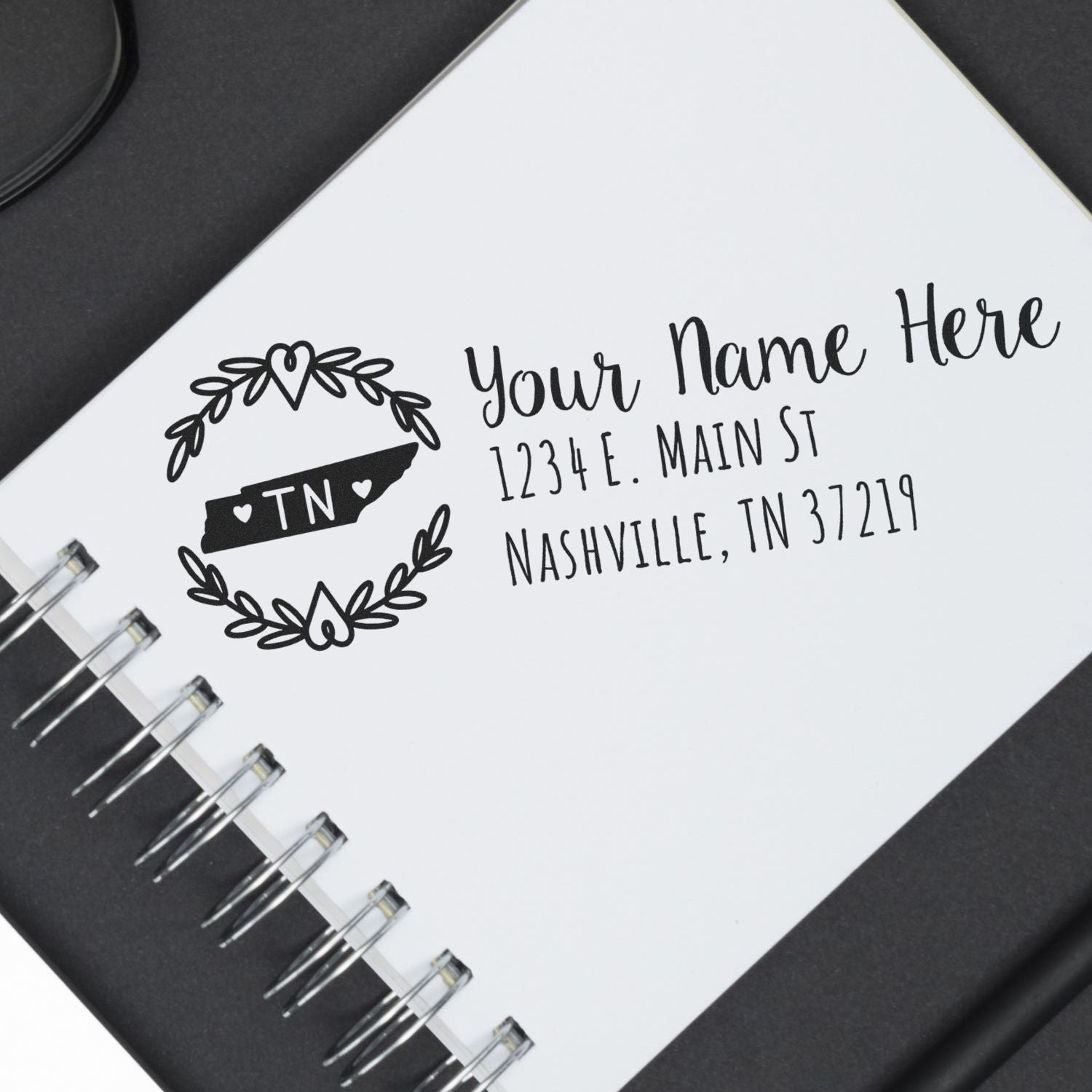 Custom rubber return address stamp with Tennessee wreath design, personalized name, and Nashville, TN address.