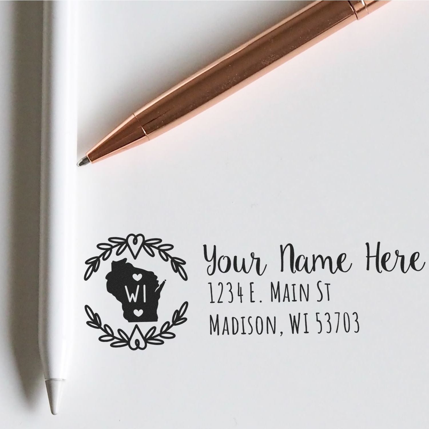 Custom Wisconsin return address rubber stamp with name, street, and city for personalized mail and stationery.