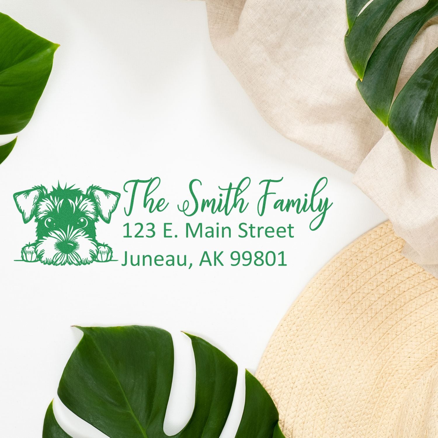 Personalized rubber address stamp with dog icon, The Smith Family name, and Juneau, AK return address.