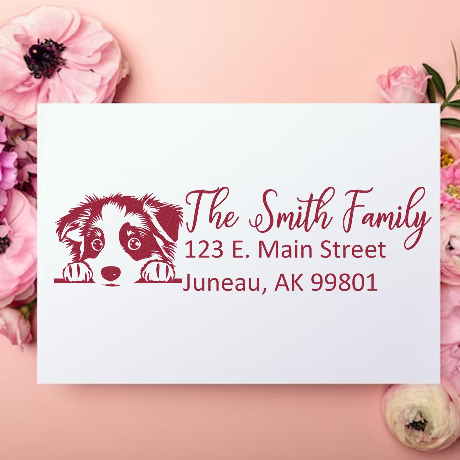 Personalized dog family return address rubber stamp with custom name, street address, and city for mailing envelopes.