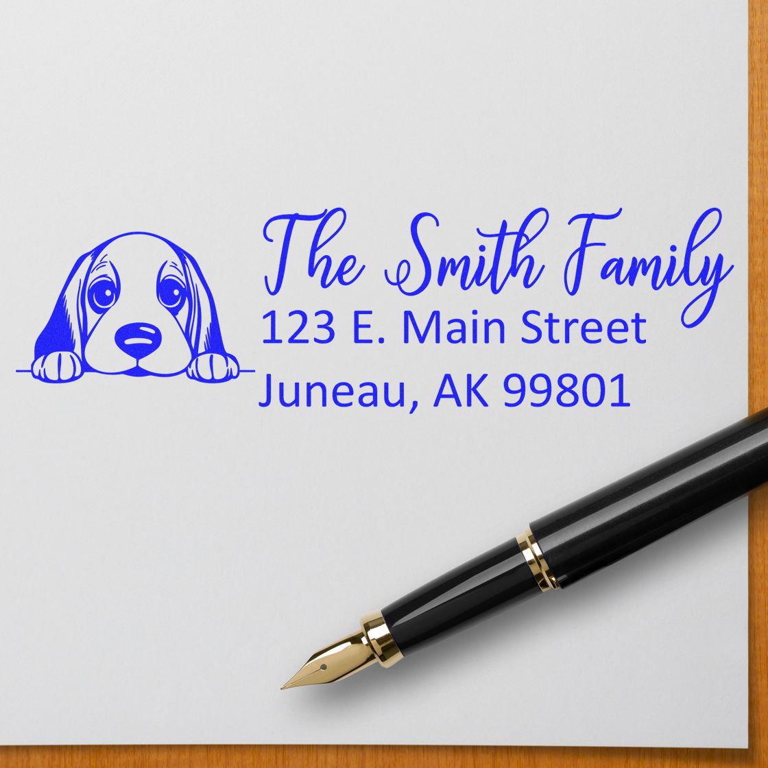 Personalized return address rubber stamp with dog logo for The Smith Family, Juneau AK 99801